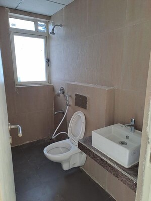 Bathroom in 2 BHK Apartment at Paradise Sai World City Phase 2, New Panvel – for Rent