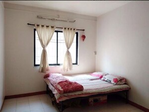 Bedroom in 1 BHK Apartment at Rohan Garden, Kothrud – for Rent
