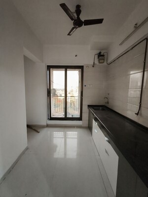 Kitchen in 2 BHK Apartment at Velocity Hill Spring, Ghodbunder Road – for Rent