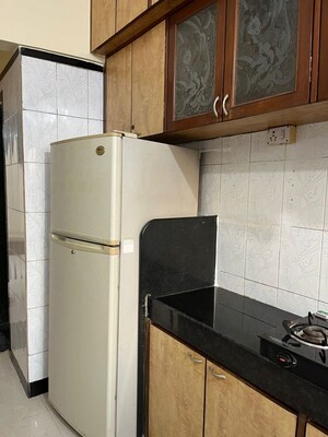 Kitchen in 1 BHK Apartment at Gayatri Corner, Kandivali East – for Rent