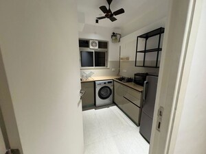 Kitchen in 1 BHK Apartment at Mahavir Kalpavruksha, Ghodbunder Road – for Rent