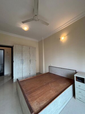 Bedroom in 2 BHK Apartment at K Raheja Heights, Malad East – for Rent