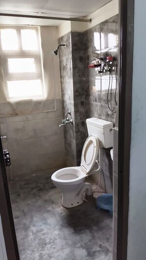 Bathroom in 1 BHK Apartment at Auric City Homes, Sector 82 – for Rent