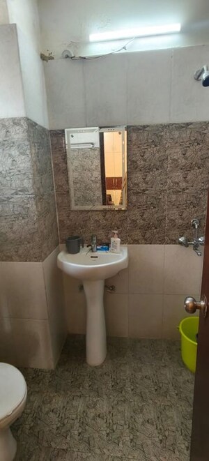 Bathroom in 2 BHK Apartment at Ansal Serene Lakeview, Sushant Golf City – for Rent
