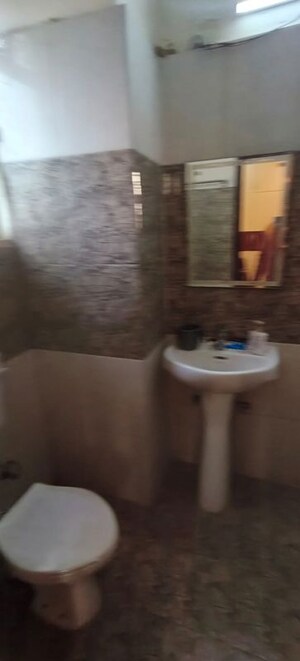 Bathroom in 2 BHK Apartment at Ansal Serene Lakeview, Sushant Golf City – for Rent