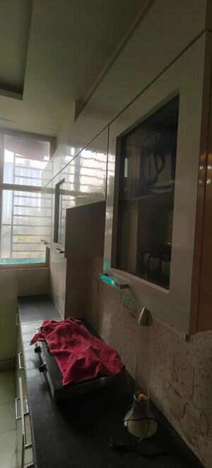 Kitchen in 2 BHK Apartment at Ansal Serene Lakeview, Sushant Golf City – for Rent