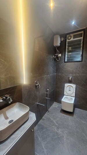 Bathroom in 2 BHK Apartment at Seawoods Estates Nri Complex, Seawoods Sector 58 – for Rent