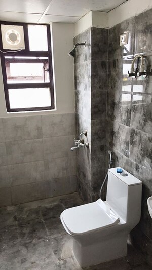 Bathroom in 1 BHK Apartment at Auric City Homes, Sector 82 – for Rent