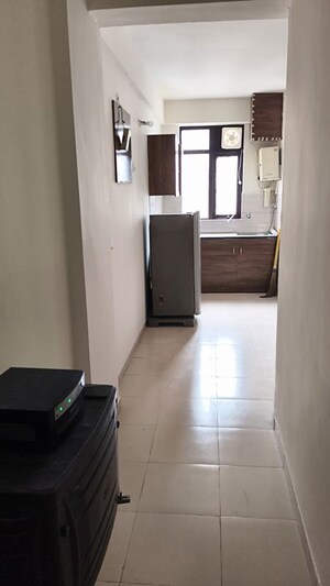 Building Lobby in 1 BHK Apartment at Auric City Homes, Sector 82 – for Rent