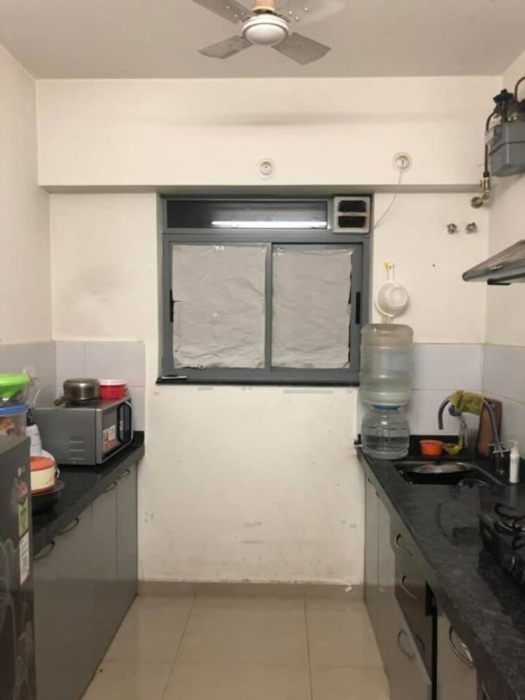 Kitchen, amanora-gold-towers 1.5 Bedroom 554 Sq.Ft. Apartment In Hadapsar Pune 10643193