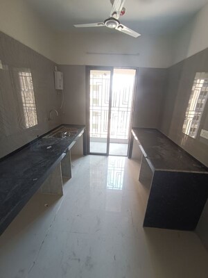 Kitchen in 2 BHK Apartment at Regency Antilia Phase V Avana, Ulhasnagar – for Rent