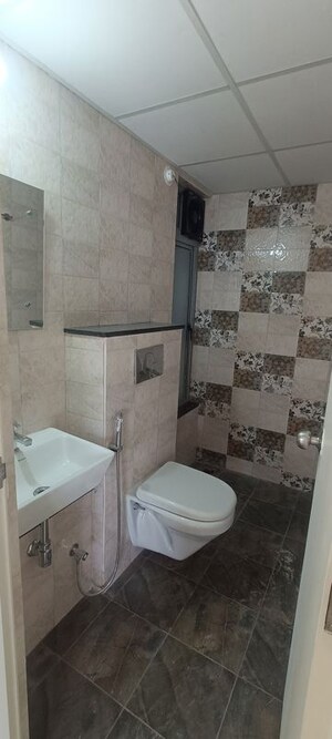 Bathroom in 2 BHK Apartment at Mahindra Happinest Tathawade Phase 1, Tathawade – for Rent