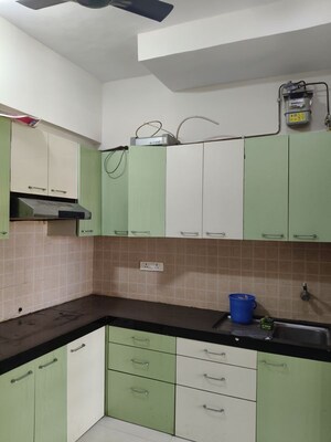 Kitchen in 3 BHK Apartment at Soham Tropical Lagoon, Ghodbunder Road – for Rent