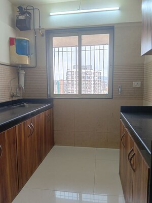 Kitchen in 3 BHK Apartment at Romell Diva, Malad West – for Rent