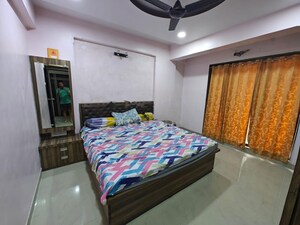 Bedroom in 2 BHK Apartment at Paradise Sai World City Phase 2, New Panvel – for Rent