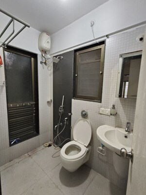 Bathroom in 3 BHK Apartment at Acme Ozone, Manpada – for Rent