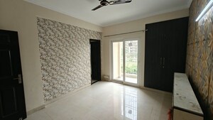 Room in 3 BHK Apartment at Paramount Floraville, Sector 137 – for Rent