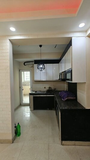 Kitchen in 3 BHK Apartment at Paramount Floraville, Sector 137 – for Rent