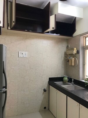 Kitchen in 2 BHK Apartment at Atlas Skywalker CHS, Andheri West – for Rent