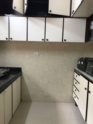 Kitchen in 2 BHK Apartment at Atlas Skywalker CHS, Andheri West – for Rent