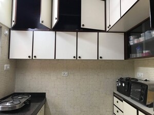 Kitchen in 2 BHK Apartment at Atlas Skywalker CHS, Andheri West – for Rent