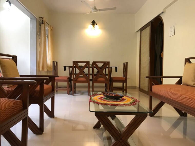 Living Room, atlas-skywalker-chs 2 Bedroom 895 Sq.Ft. Apartment In Andheri West Mumbai 10643334