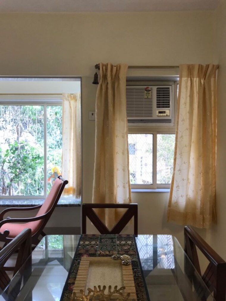Living Room, atlas-skywalker-chs 2 Bedroom 895 Sq.Ft. Apartment In Andheri West Mumbai 10643334