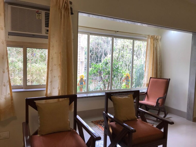 Living Room, atlas-skywalker-chs 2 Bedroom 895 Sq.Ft. Apartment In Andheri West Mumbai 10643334