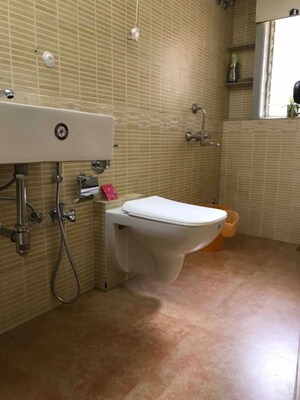 Bathroom in 2 BHK Apartment at Atlas Skywalker CHS, Andheri West – for Rent