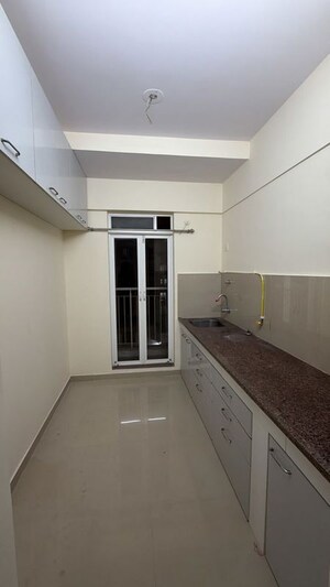 Kitchen in 1 BHK Apartment at Metropolis Bayside, Kasarvadavali – for Rent