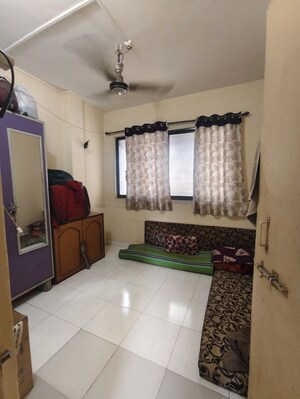 Bedroom in 1 BHK Apartment at Asha Smruti, Dombivli West – for Sale
