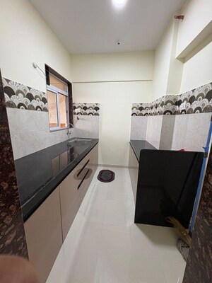 Kitchen in 2 BHK Apartment at Dosti Tulip, Balkum Pada – for Rent