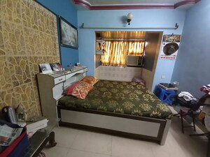 Bedroom in 1 BHK Apartment at Satellite Garden, Goregaon East – for Rent