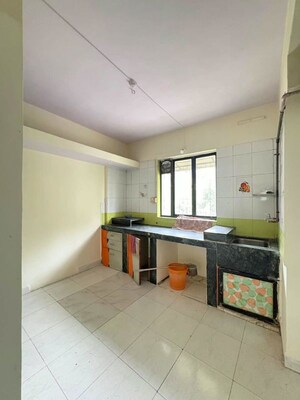 Kitchen in 1 BHK Apartment at Ganesh Sadan Apartment, Dombivli West – for Sale
