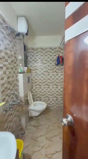 Bathroom in 2 BHK Apartment at Man Opus, Mira Road – for Sale