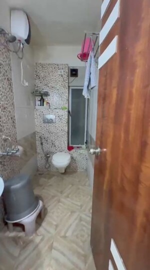 Bathroom in 2 BHK Apartment at Man Opus, Mira Road – for Sale