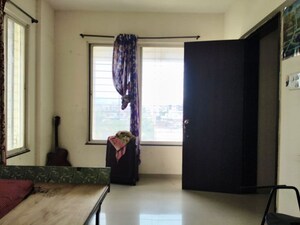 Room in 2 BHK Apartment at Krisala Krisanta Skyline, Dehu Road – for Rent