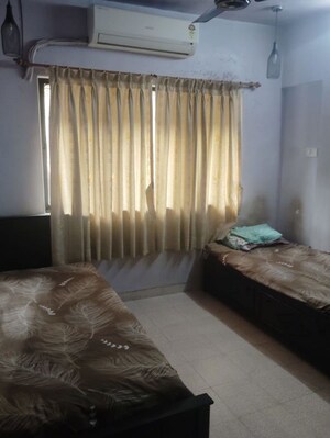 Bedroom in 1 BHK Apartment at Lalani Residency, Kavesar – for Rent