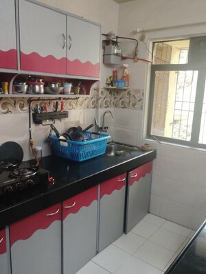 Kitchen in 1 BHK Apartment at Lalani Residency, Kavesar – for Rent