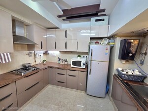Kitchen in 3 BHK Penthouse at Vasundhara Enclave – for Sale
