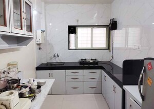 Kitchen in 2.5 BHK Apartment at Yash Sankul, Pimple Saudagar – for Rent