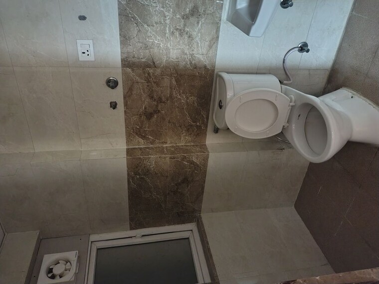 Bathroom, amrapali-riverview 2 Bedroom 845 Sq.Ft. Apartment In Amrapali Leisure Valley Greater Noida 10643694