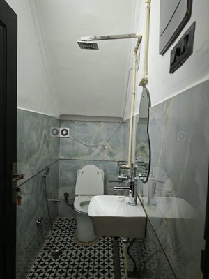 Bathroom in 2 BHK Builder Floor at Kalkaji – for Rent