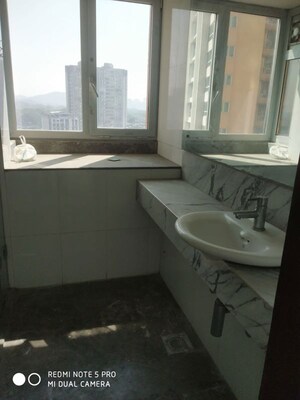 Bathroom in 4 BHK Apartment at DB Woods, Goregaon East – for Rent