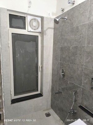 Bathroom in 1 BHK Apartment at Omkar Signet, Malad East – for Rent