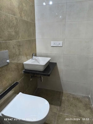 Bathroom in 1 BHK Apartment at Omkar Signet, Malad East – for Rent