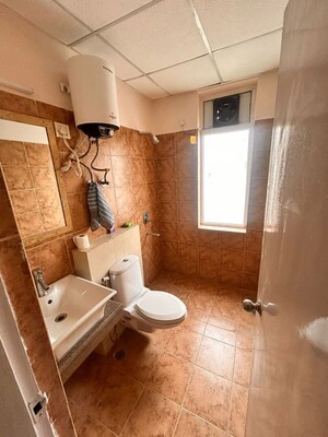 Bathroom in 3 BHK Builder Floor at Smart World Orchard, Sector 61 – for Rent