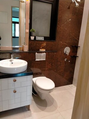 Bathroom in 1 BHK Apartment at MICL Aaradhya Highpark, Mira Road – for Rent