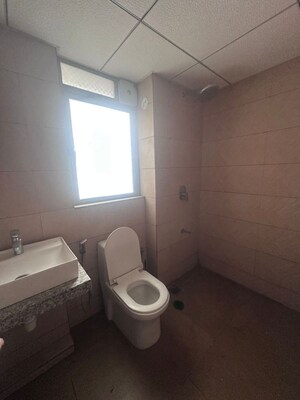 Bathroom in 2 BHK Apartment at Kalpataru Immensa, Kolshet Road – for Rent