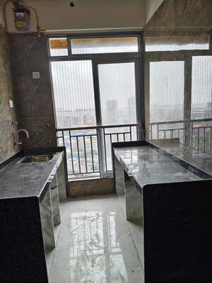 Kitchen in 2 BHK Apartment at DGS Sheetal Ekta, Malad East – for Rent